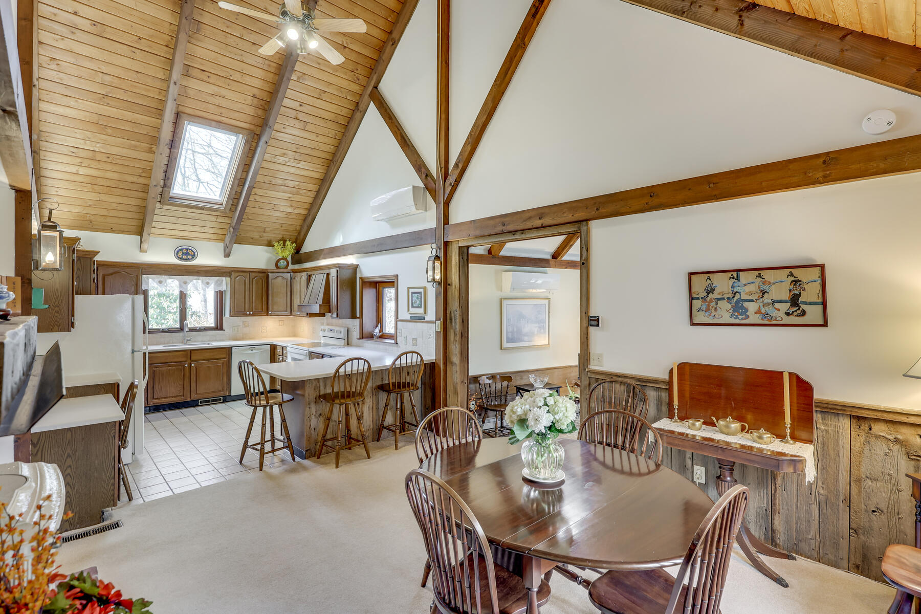 84 Beach Road Orleans, MA 02653 - Photo 10 of 45 a view of a dining room with furniture