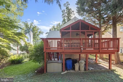 a balcony with trees in front of it