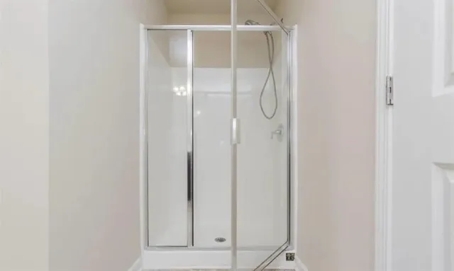 a bathroom with a bathtub and a sink