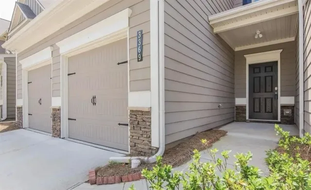 a view of entryway with wooden floor