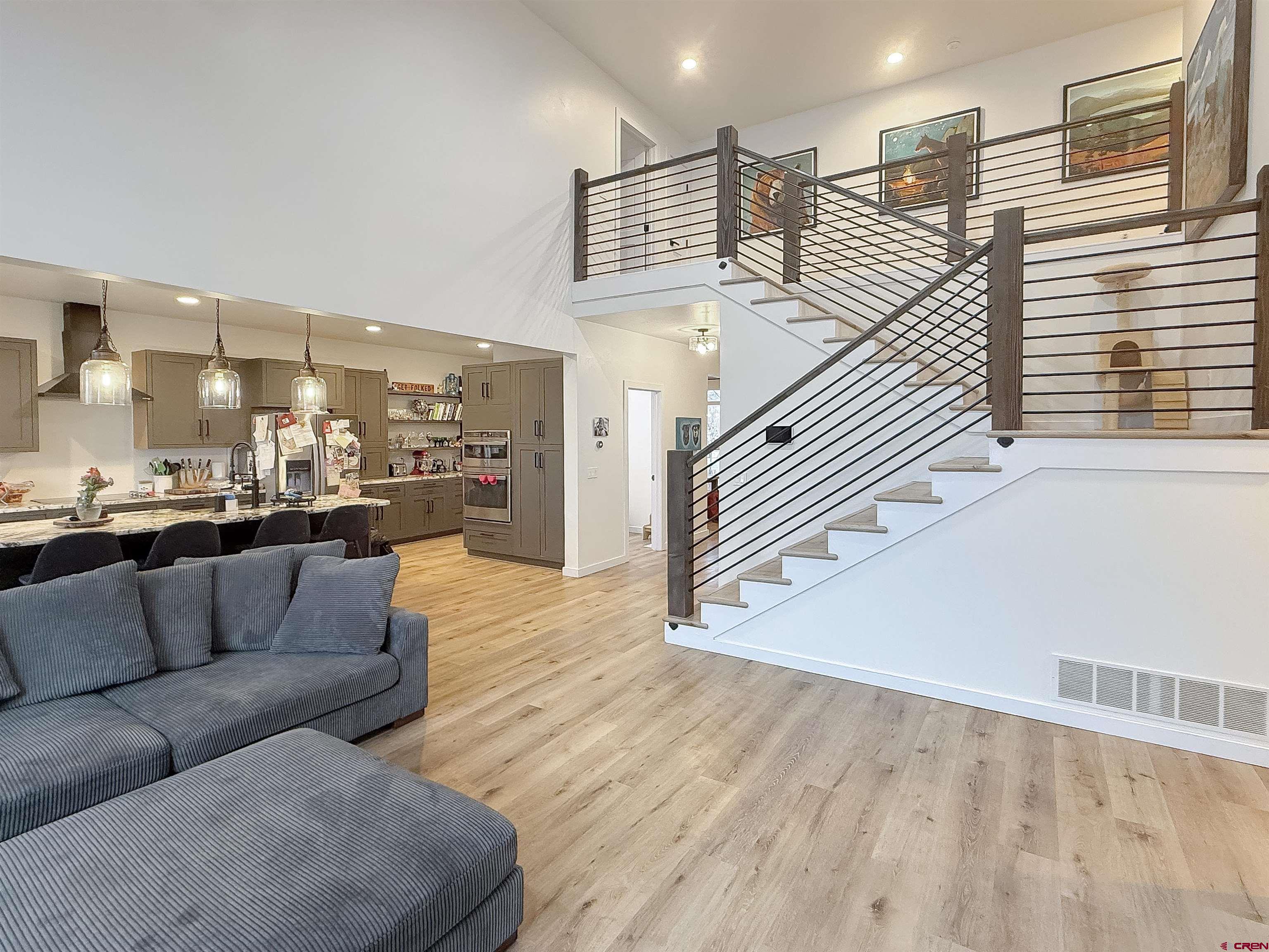 903 South Oak Street Cortez, CO 81321 - Photo 14 of 44 a living room with furniture and wooden floor