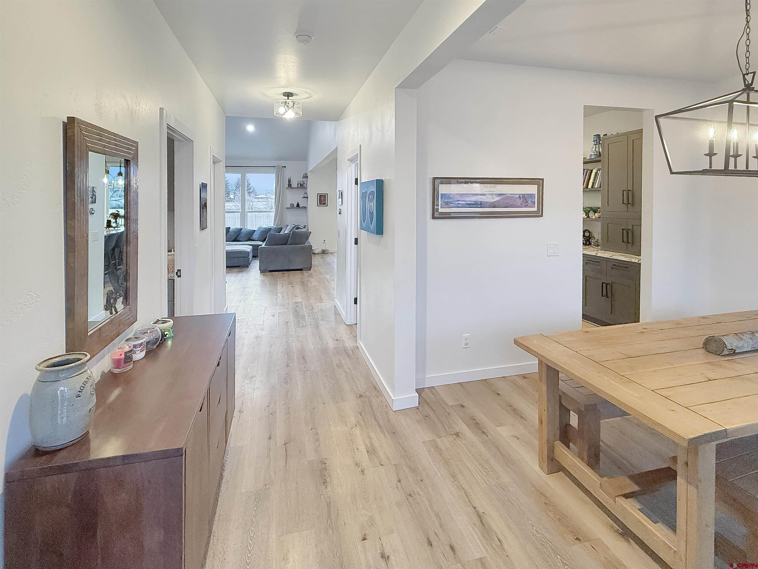 903 South Oak Street Cortez, CO 81321 - Photo 15 of 44 a view of a kitchen cabinets and wooden floor
