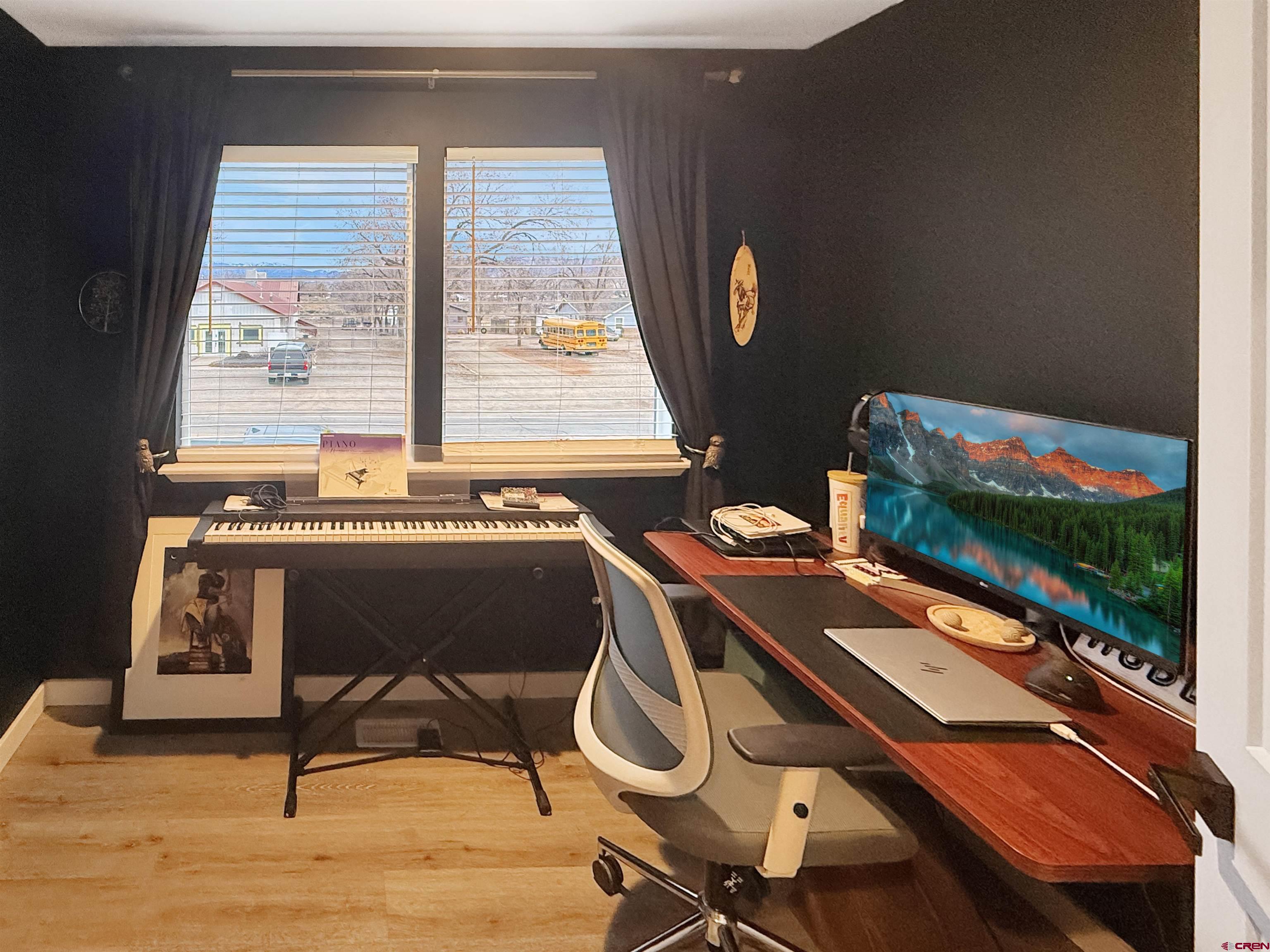 903 South Oak Street Cortez, CO 81321 - Photo 29 of 44 a room with chairs and tables