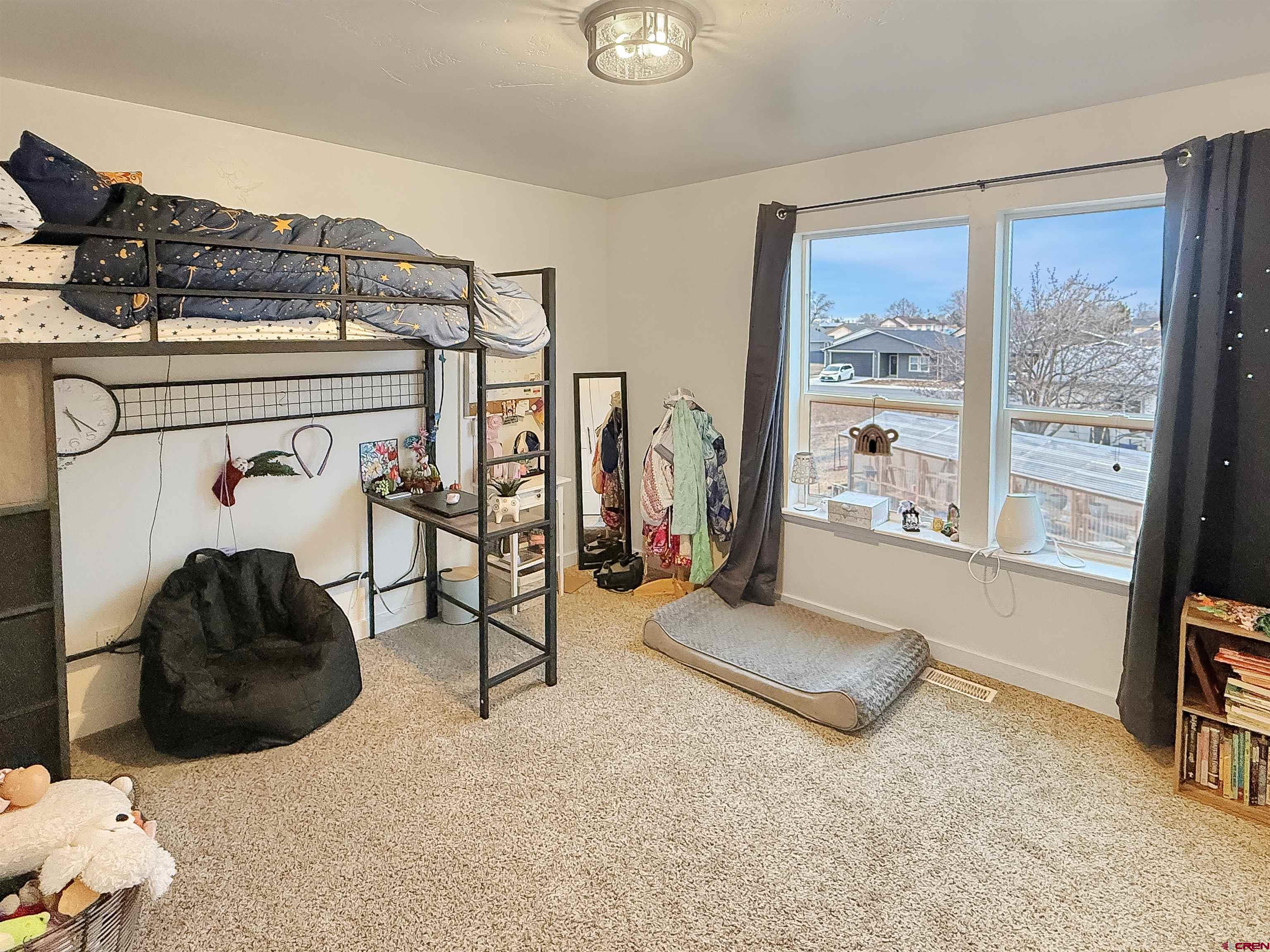 903 South Oak Street Cortez, CO 81321 - Photo 32 of 44 a view of a room with gym equipment