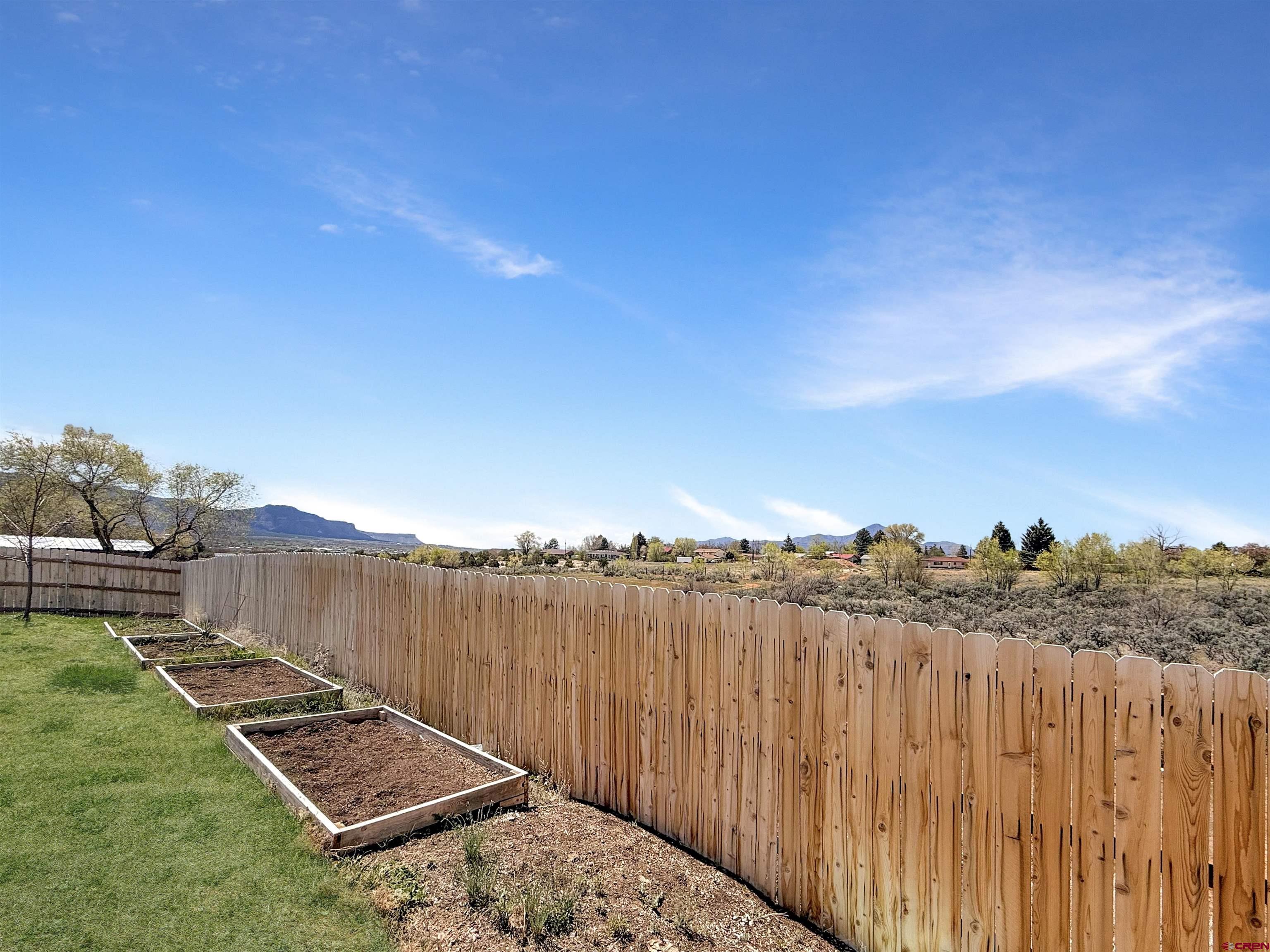 903 South Oak Street Cortez, CO 81321 - Photo 39 of 44 a view of a balcony with wooden floor and city view