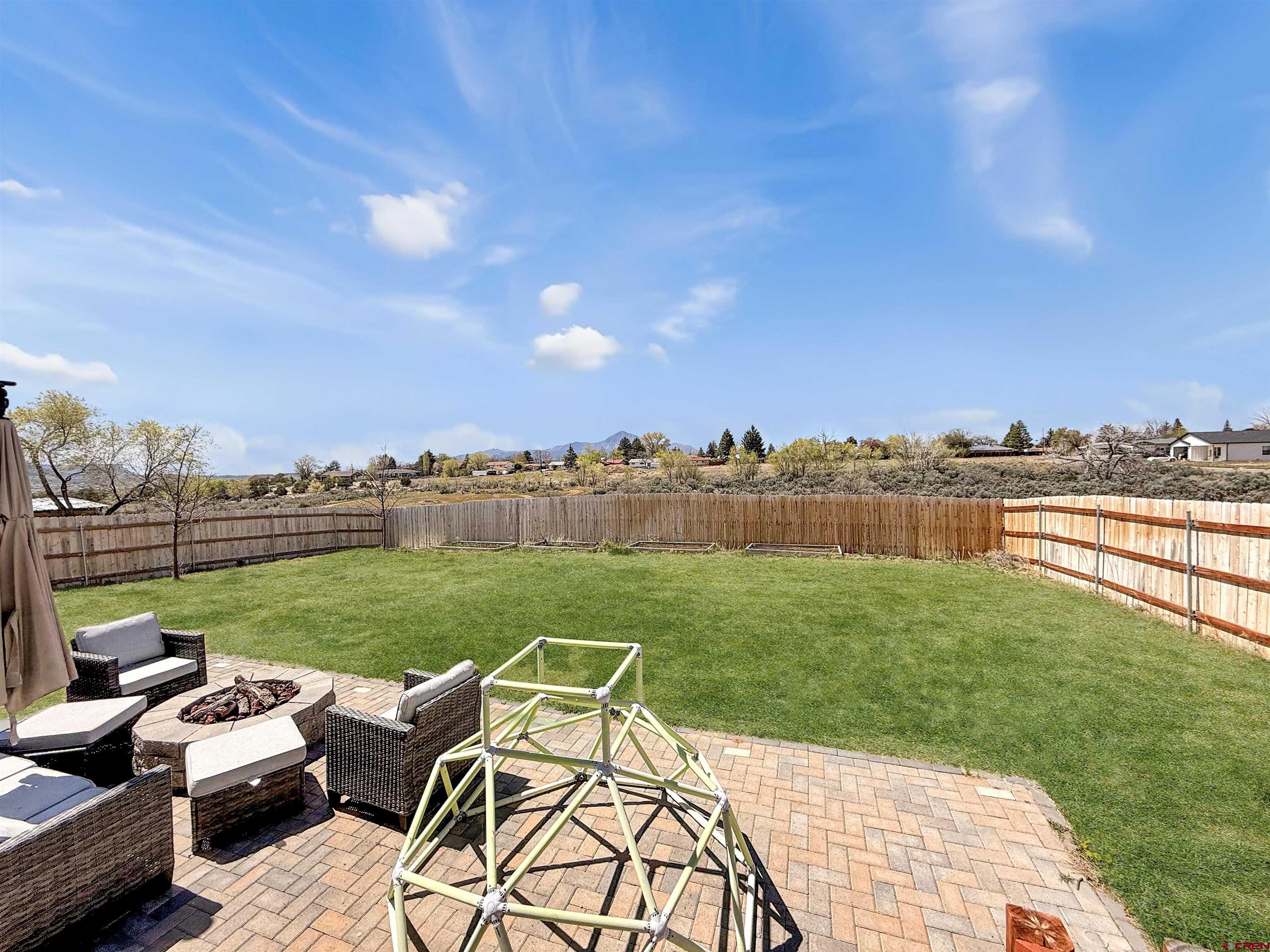 903 South Oak Street Cortez, CO 81321 - Photo 4 of 44 a view of a garden with furniture