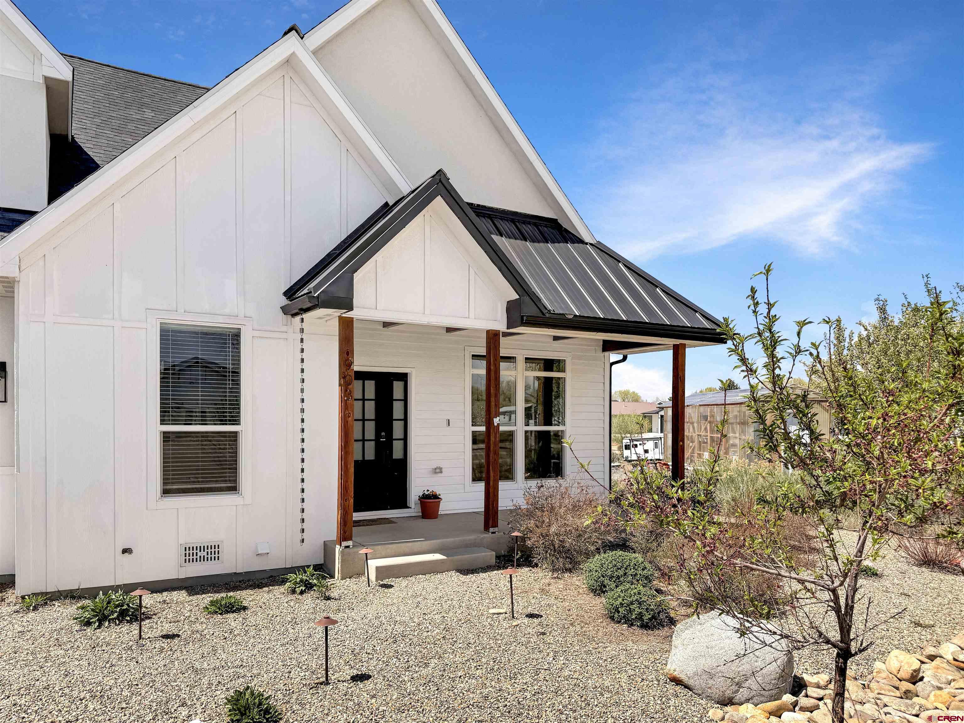 903 South Oak Street Cortez, CO 81321 - Photo 43 of 44 a view of a house with a yard