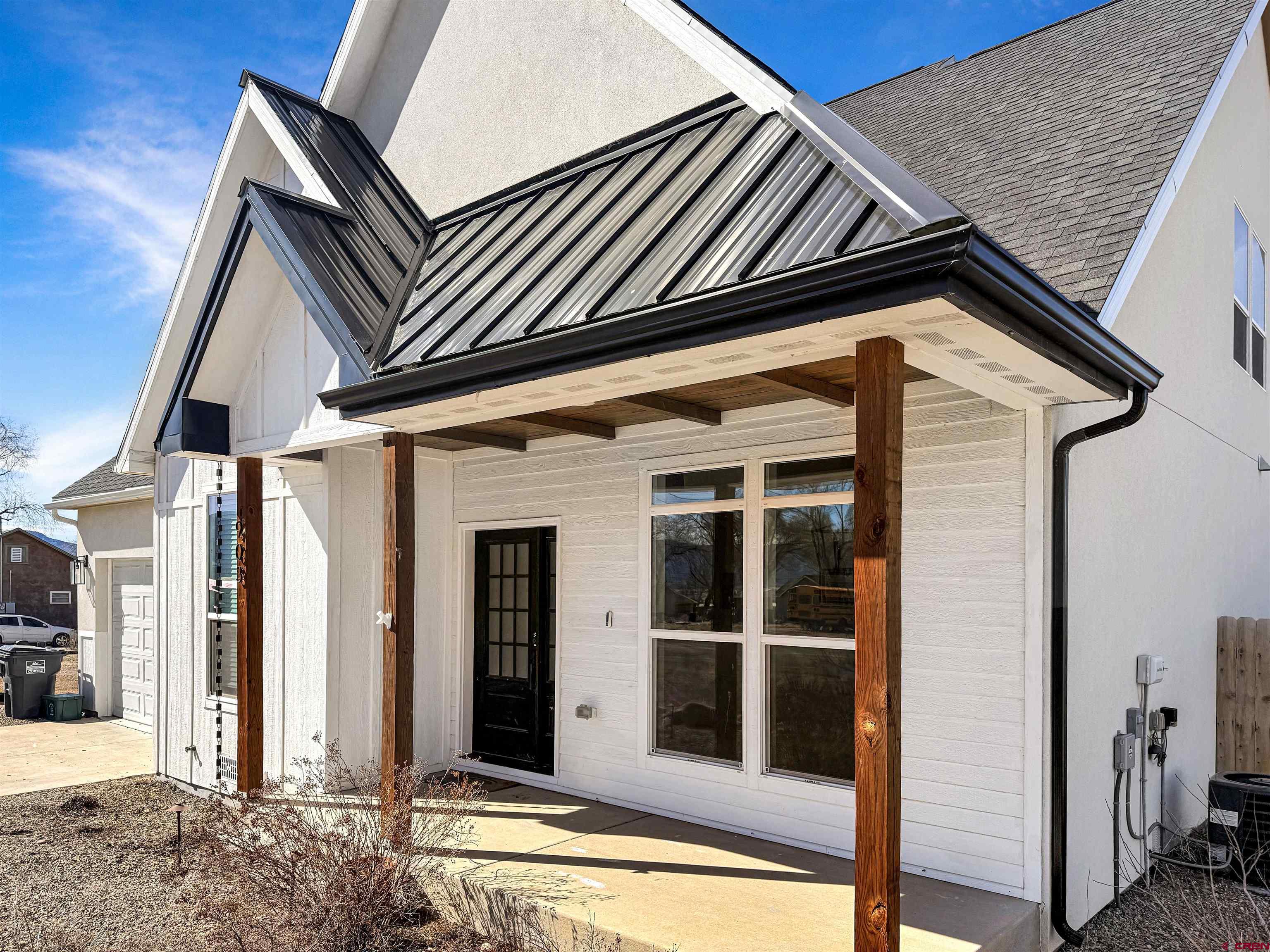 903 South Oak Street Cortez, CO 81321 - Photo 44 of 44 a front view of a house with a porch