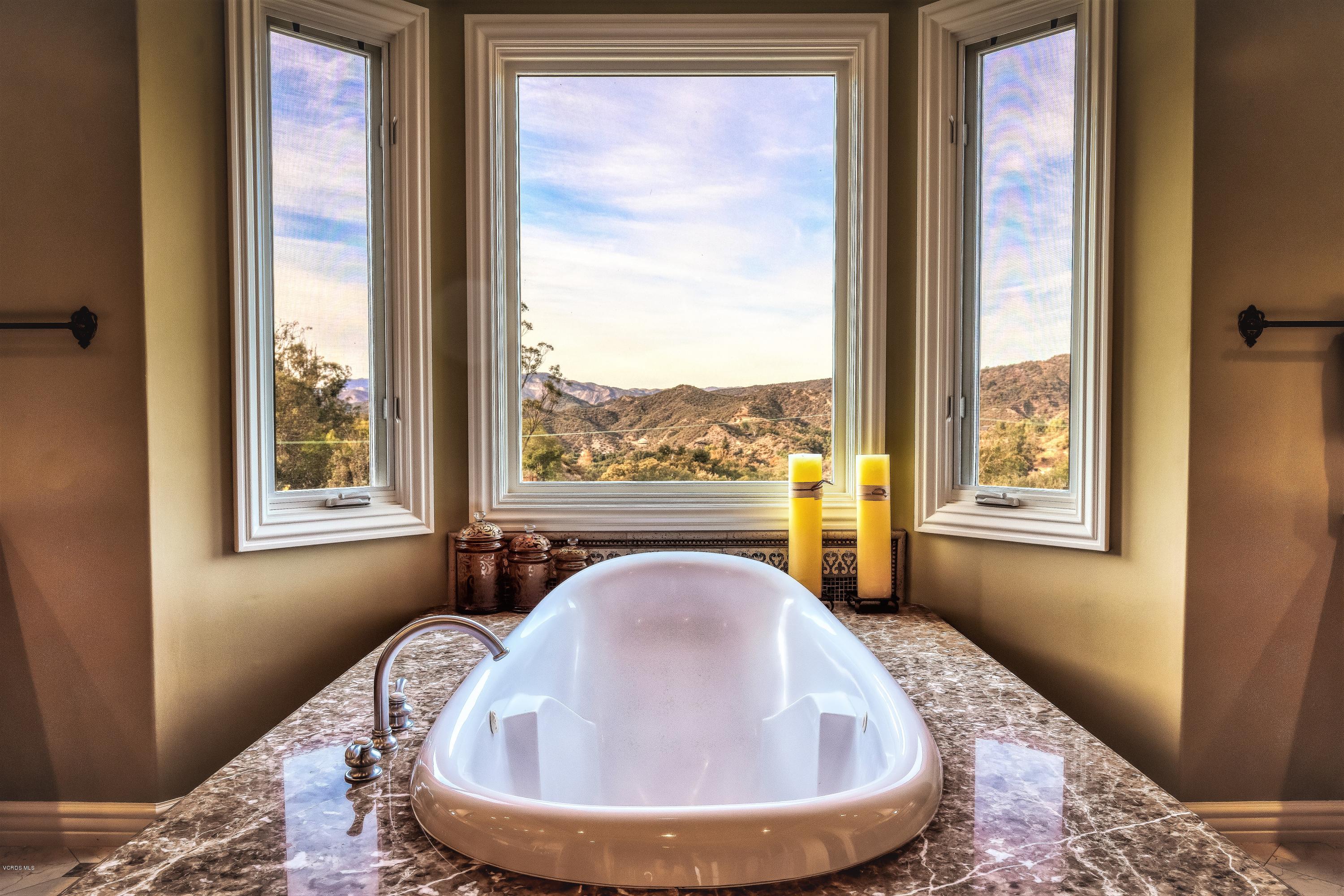 25741 Piuma Road Calabasas, CA 91302 - Photo 20 of 38 a view of a window with swimming pool