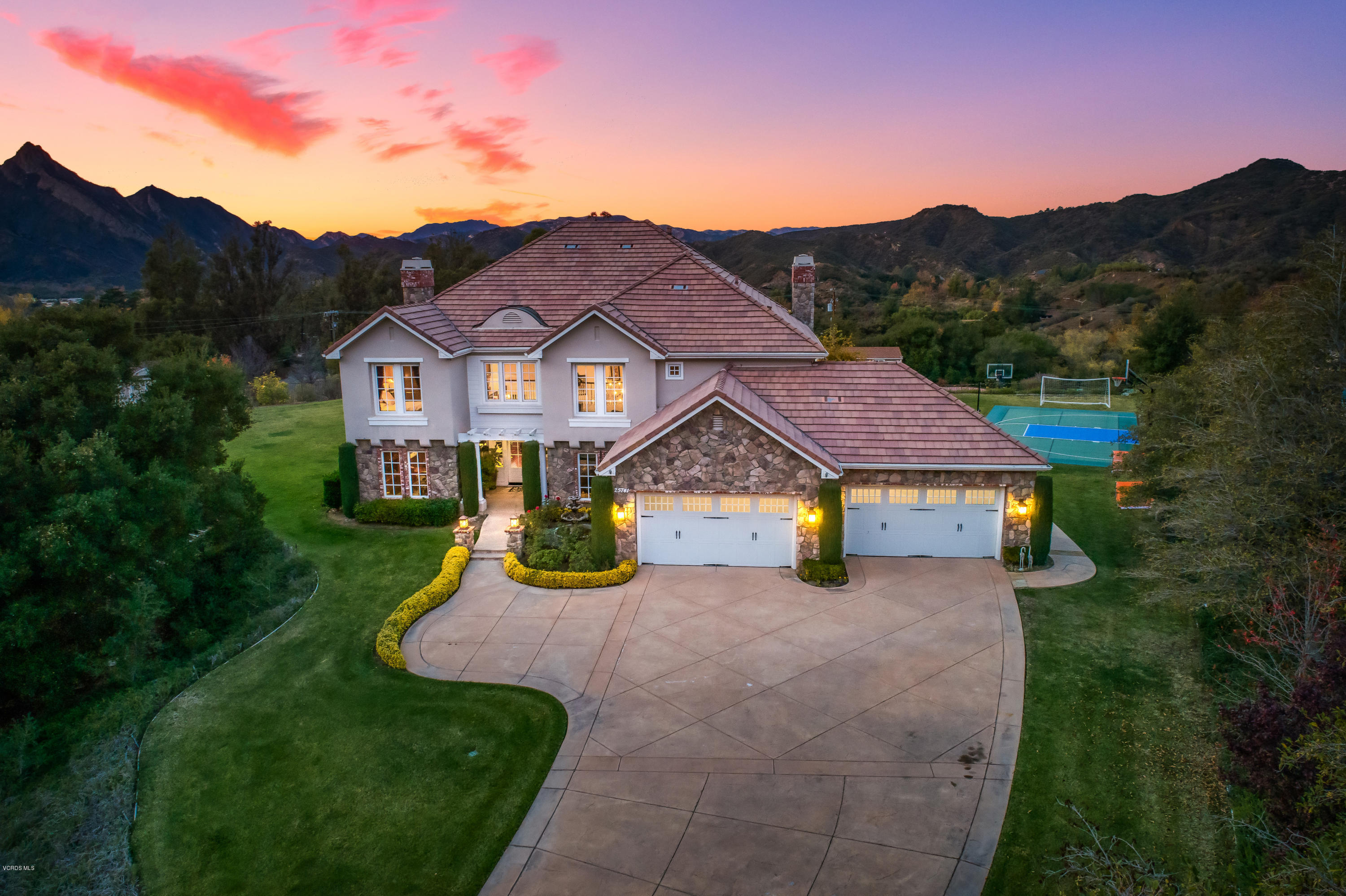 25741 Piuma Road Calabasas, CA 91302 - Photo 3 of 38 a view of a house with a big yard and large tree