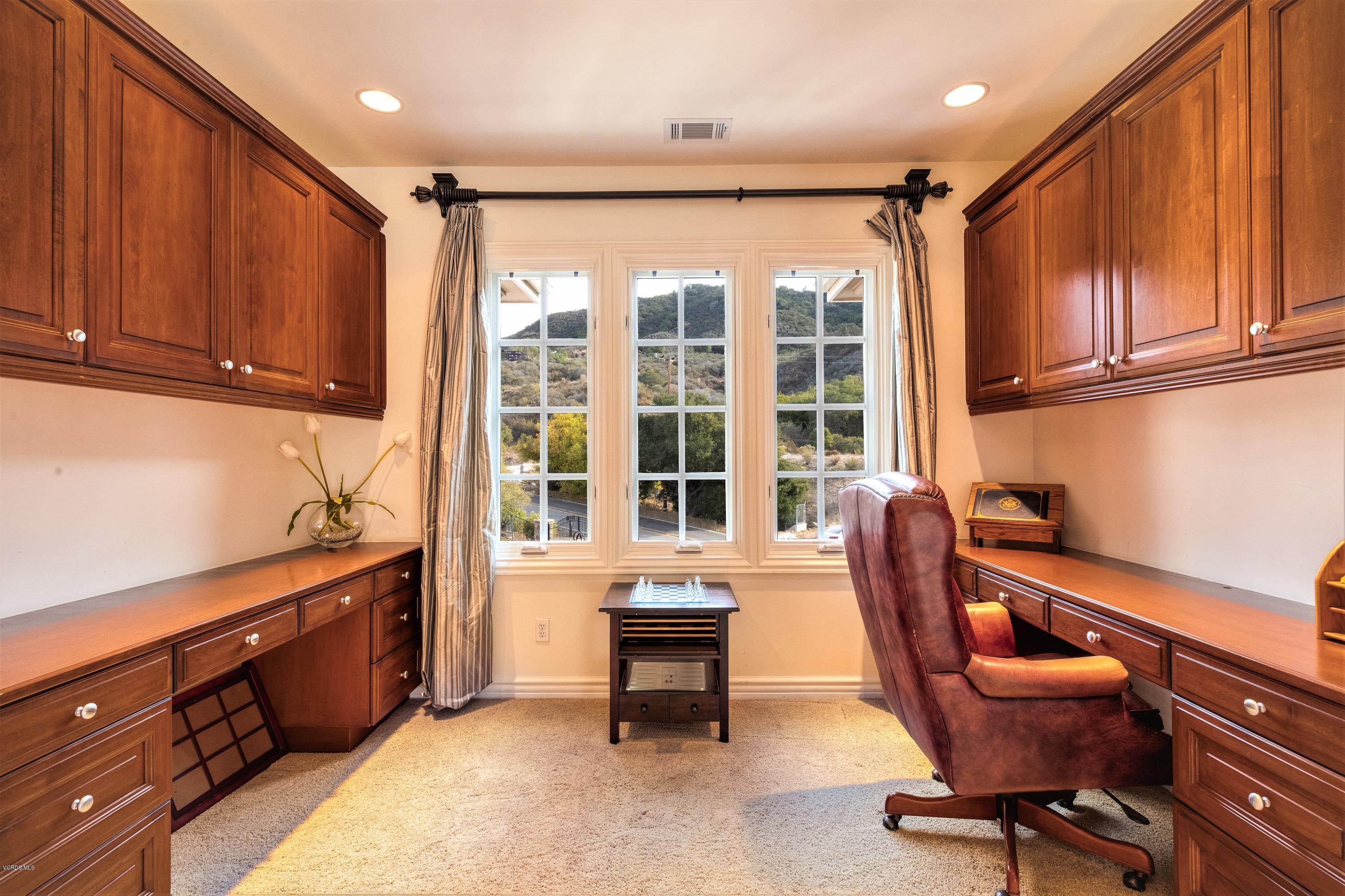 25741 Piuma Road Calabasas, CA 91302 - Photo 28 of 38 a view of a workspace with furniture and a window