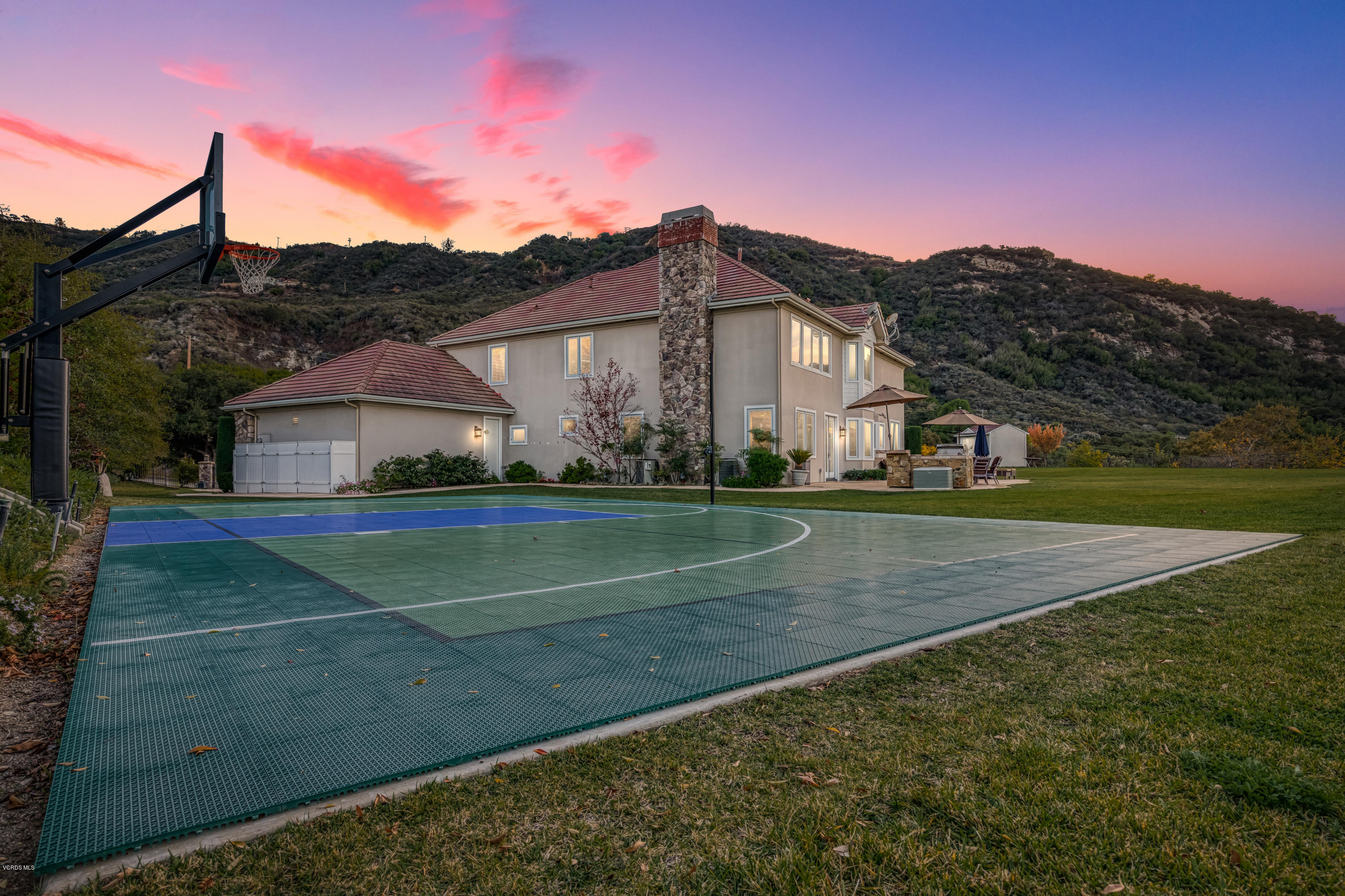 25741 Piuma Road Calabasas, CA 91302 - Photo 36 of 38 a view of house with a yard