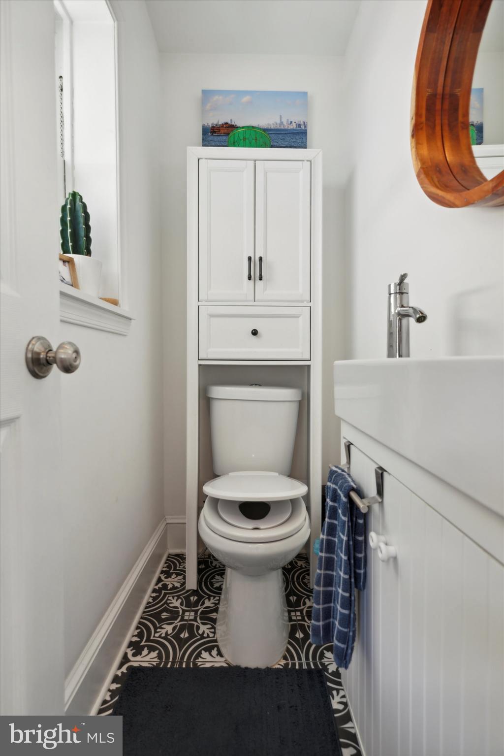 322 Woodbine Avenue Narberth, PA 19072 - Photo 12 of 26 a bathroom with a toilet and a sink