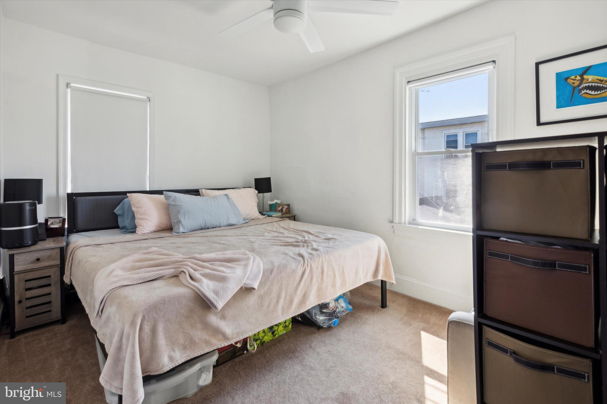 322 Woodbine Avenue Narberth, PA 19072 - Photo 14 of 26 a bedroom with a bed and a table