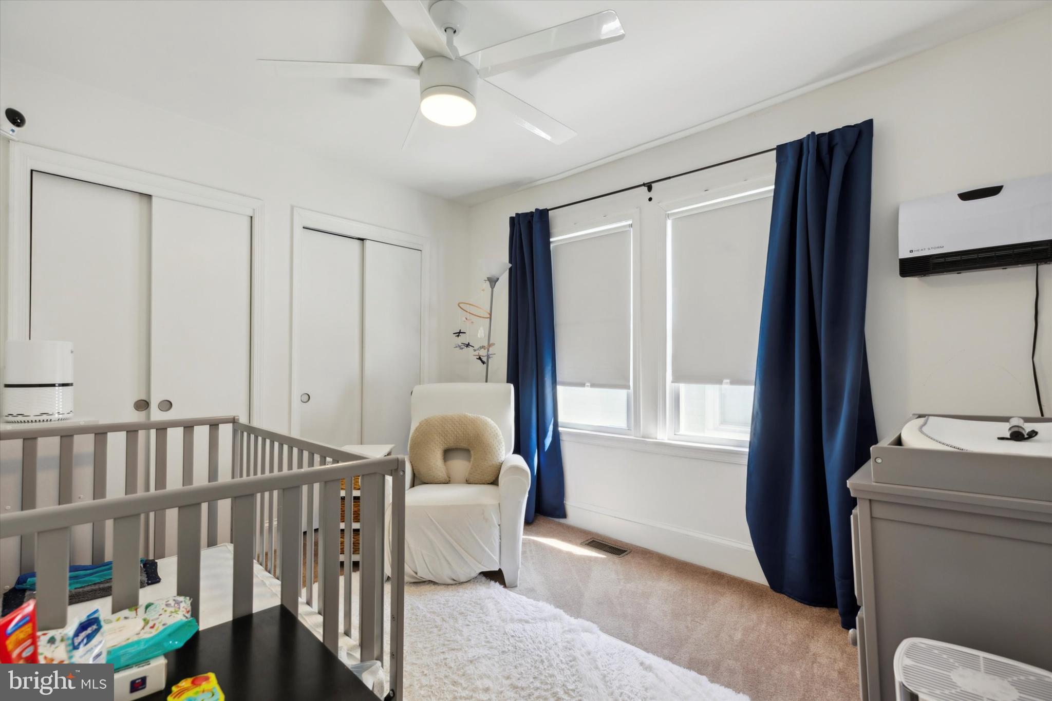 322 Woodbine Avenue Narberth, PA 19072 - Photo 18 of 26 a living room with furniture and a window
