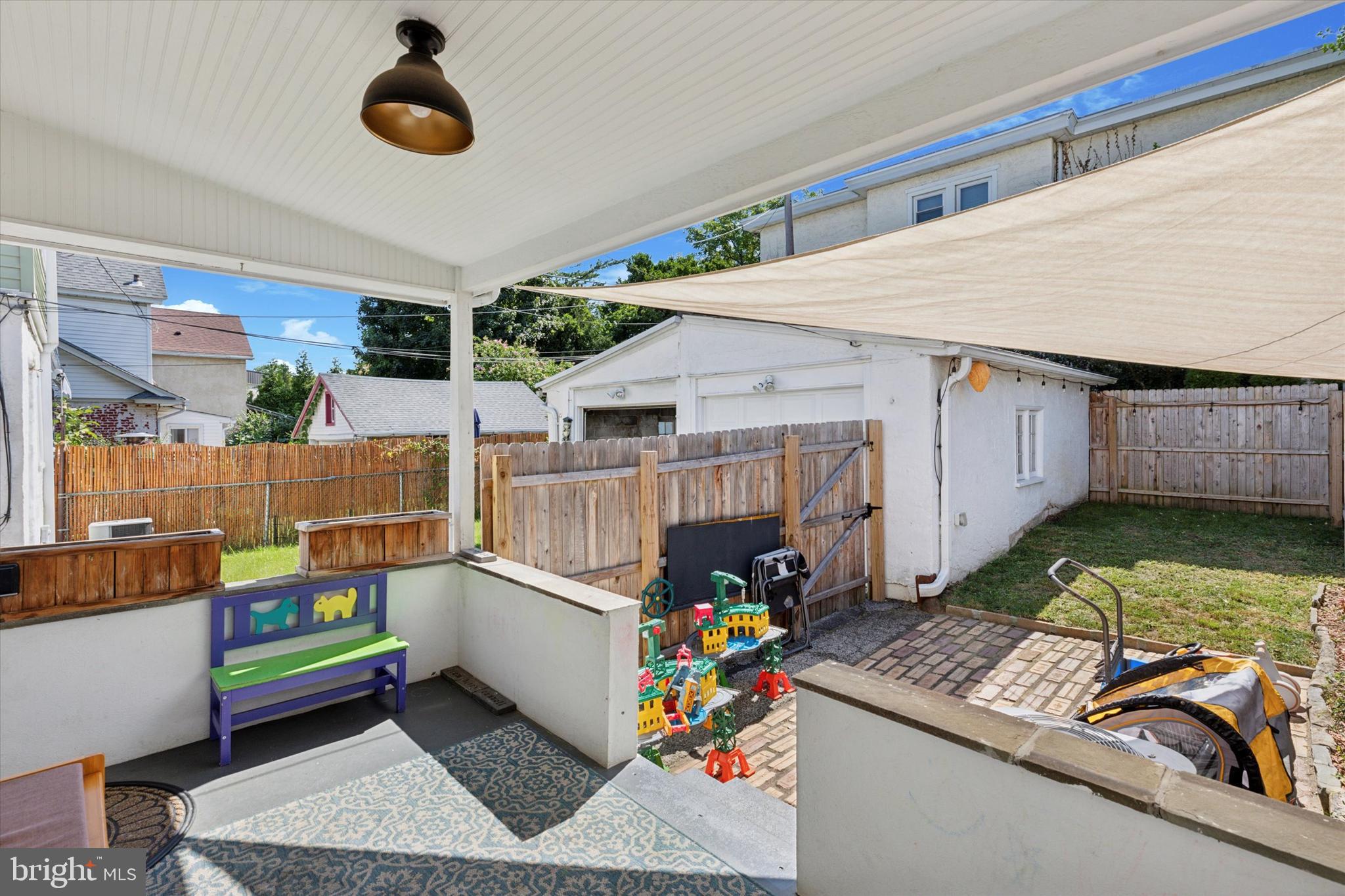 322 Woodbine Avenue Narberth, PA 19072 - Photo 23 of 26 a room with furniture and a table