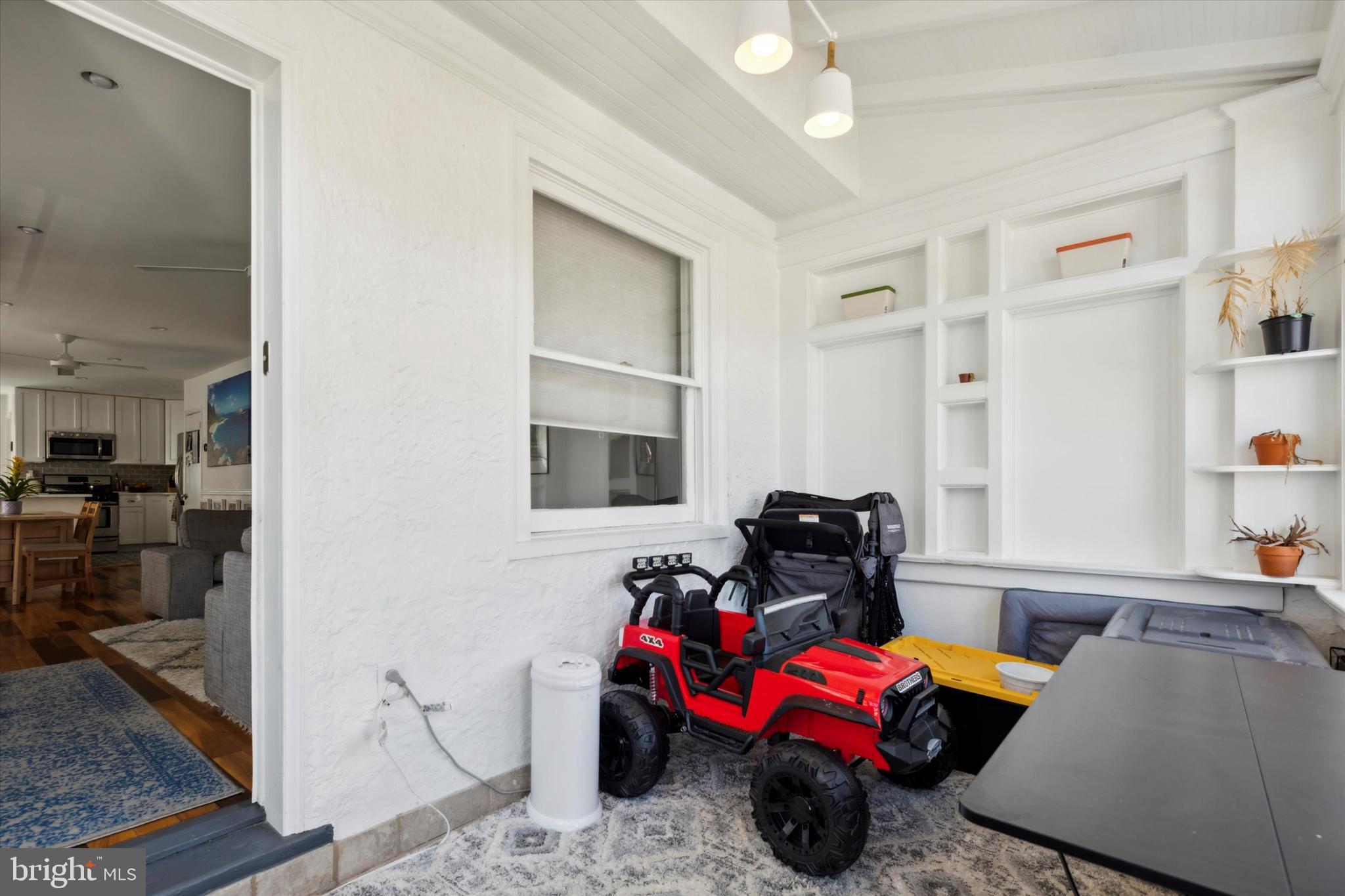 322 Woodbine Avenue Narberth, PA 19072 - Photo 3 of 26 a bedroom with furniture and a window