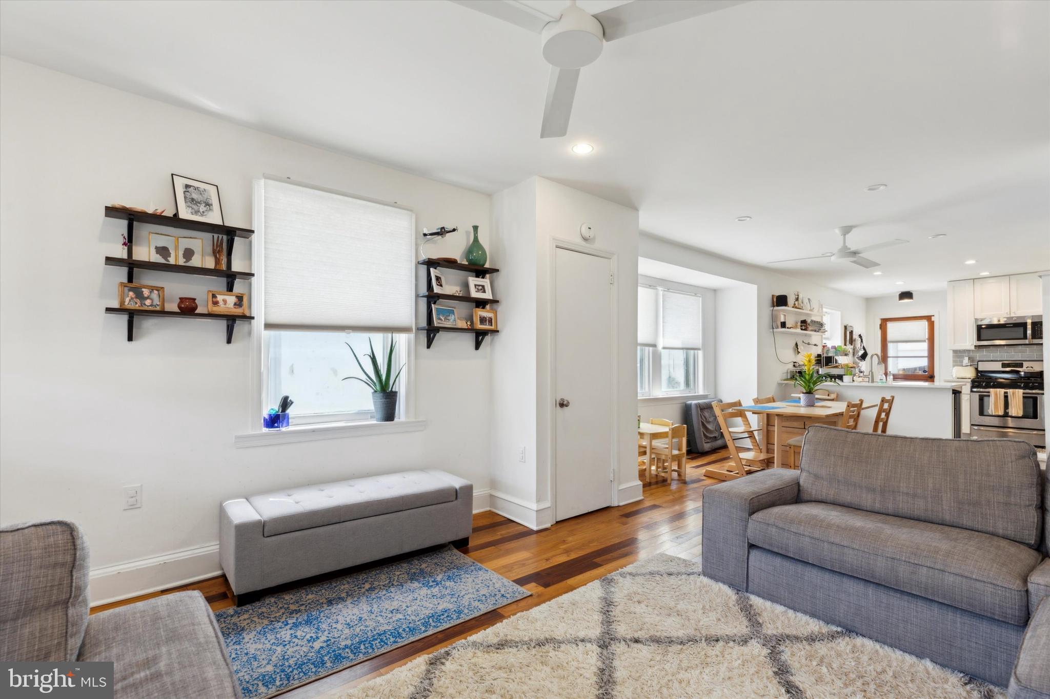 322 Woodbine Avenue Narberth, PA 19072 - Photo 4 of 26 a living room with furniture and a wooden floor