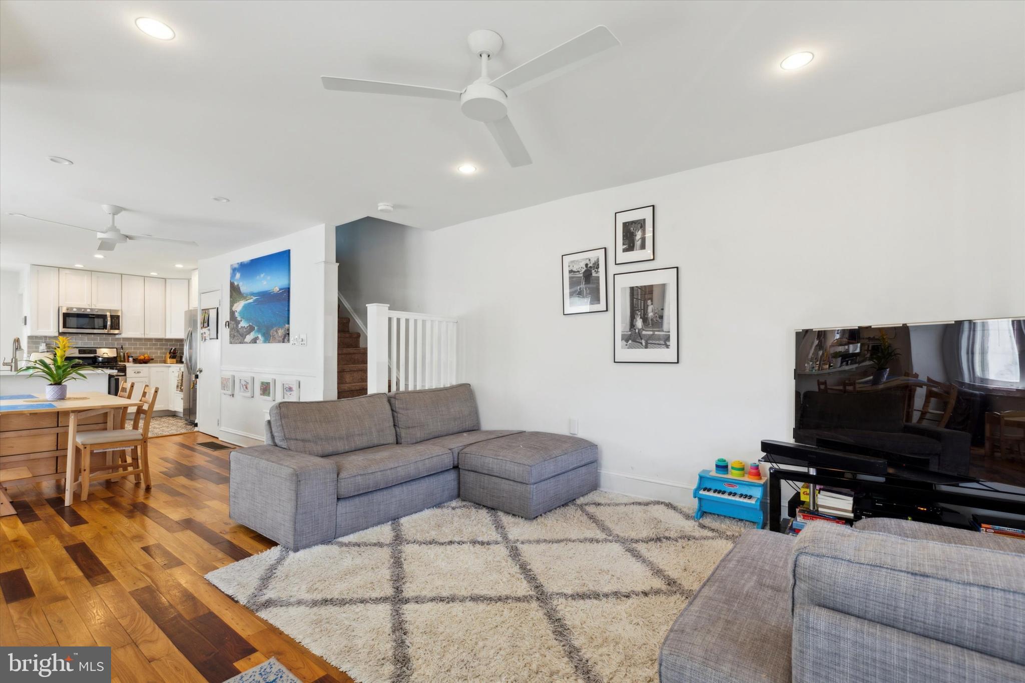 322 Woodbine Avenue Narberth, PA 19072 - Photo 5 of 26 a living room with furniture and a flat screen tv