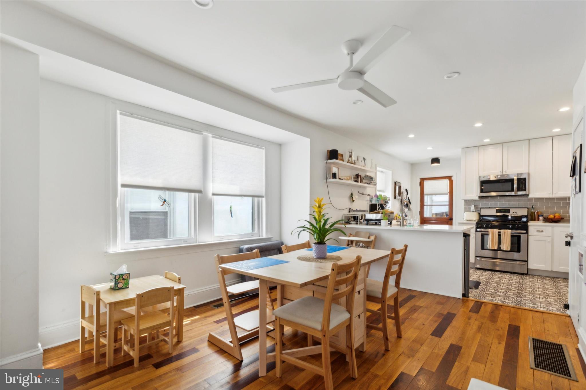 322 Woodbine Avenue Narberth, PA 19072 - Photo 6 of 26 a view of a dining room with furniture window and wooden floor