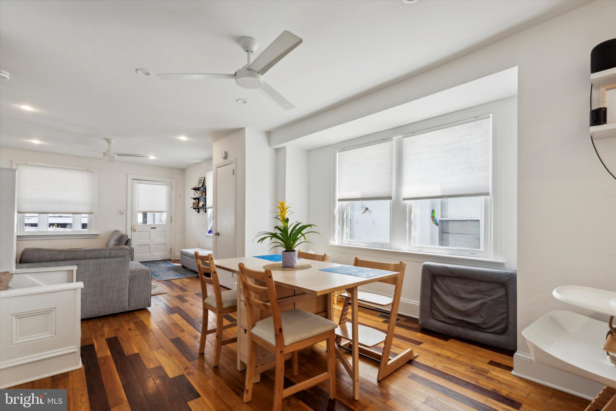 322 Woodbine Avenue Narberth, PA 19072 - Photo 7 of 26 a view of a dining room with furniture a rug and wooden floor