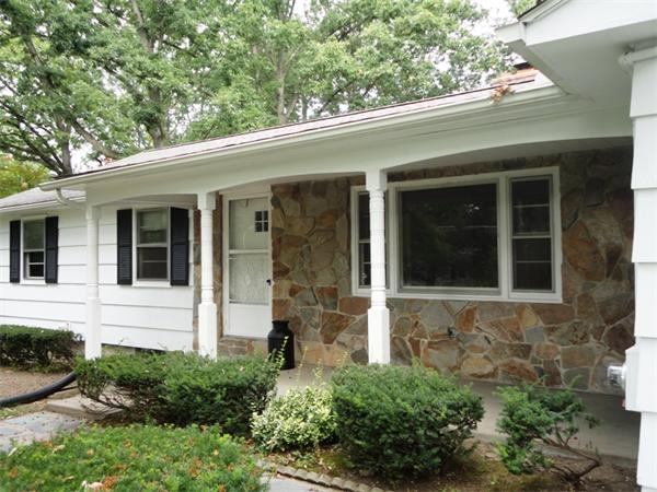 219 Forest Hills Road Springfield, MA 01128 - Photo 18 of 18 a front view of a house with a garden