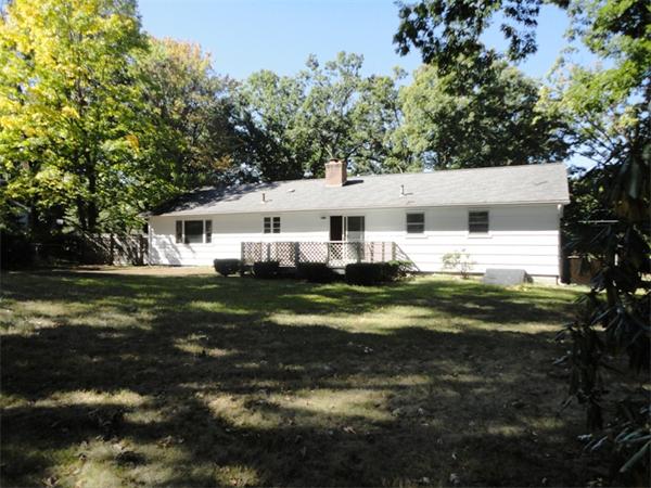 219 Forest Hills Road Springfield, MA 01128 - Photo 7 of 18 a front view of a house with a garden