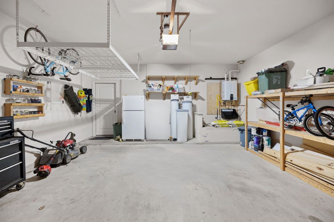 454 Shale Circle Buda, TX 78610 - Photo 23 of 27 a view of a room with gym equipment