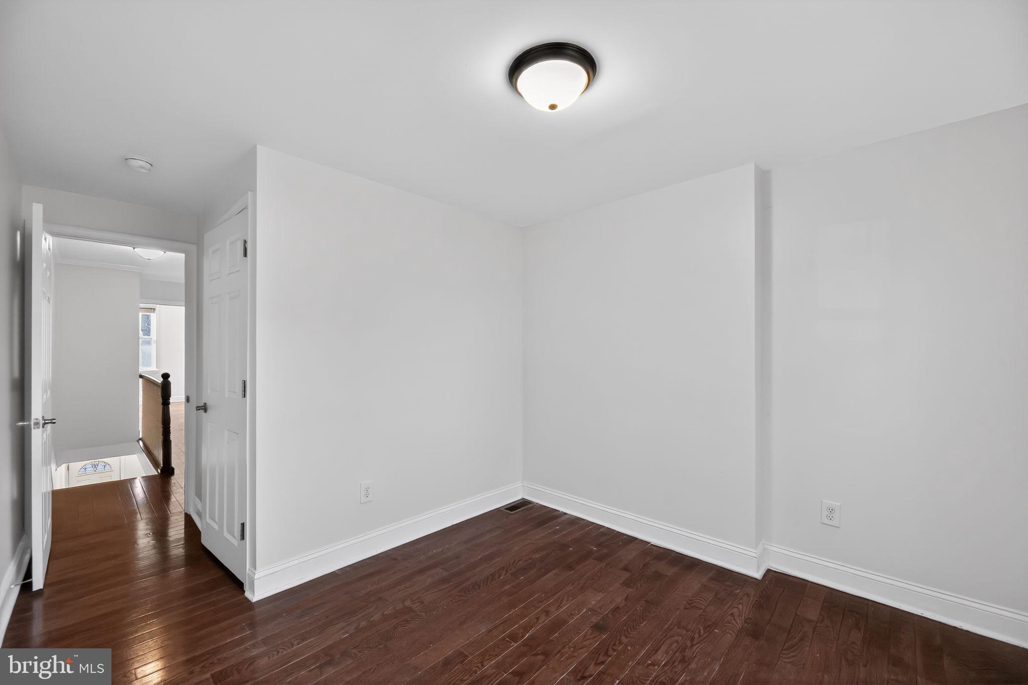 2413 North Carlisle Street Philadelphia, PA 19132 - Photo 12 of 30 a view of a room with wooden floor
