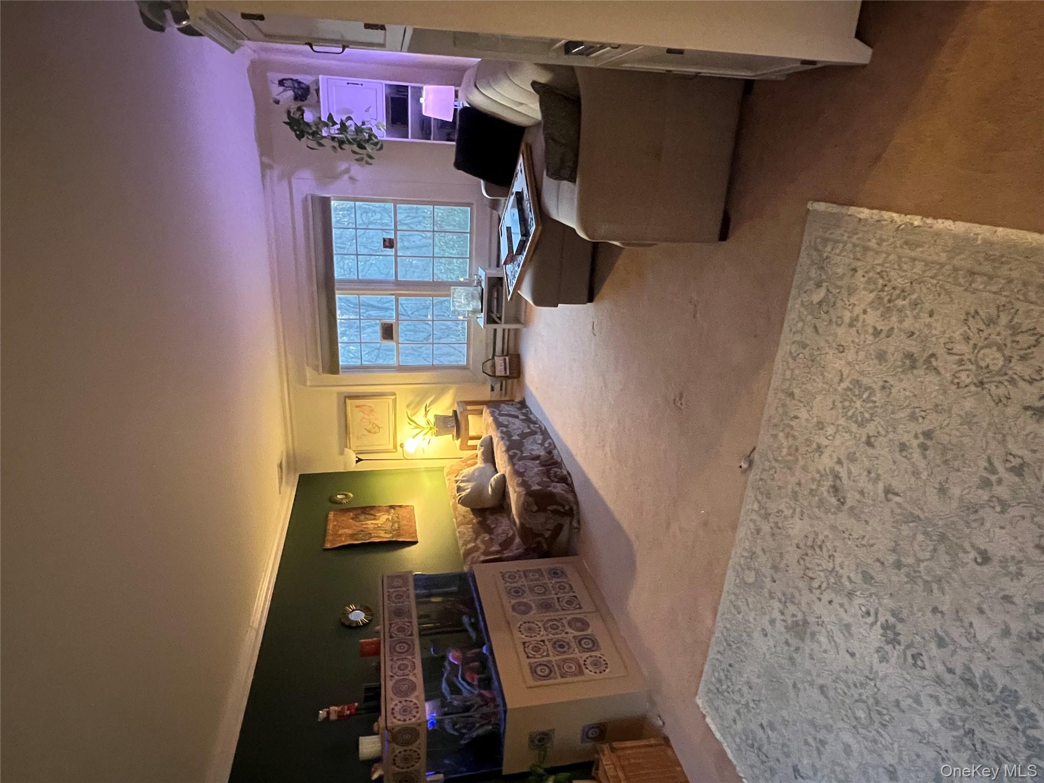 17 Birch Hill Road Putnam Valley, NY 10579 - Photo 14 of 24 a living room with furniture and a lamp