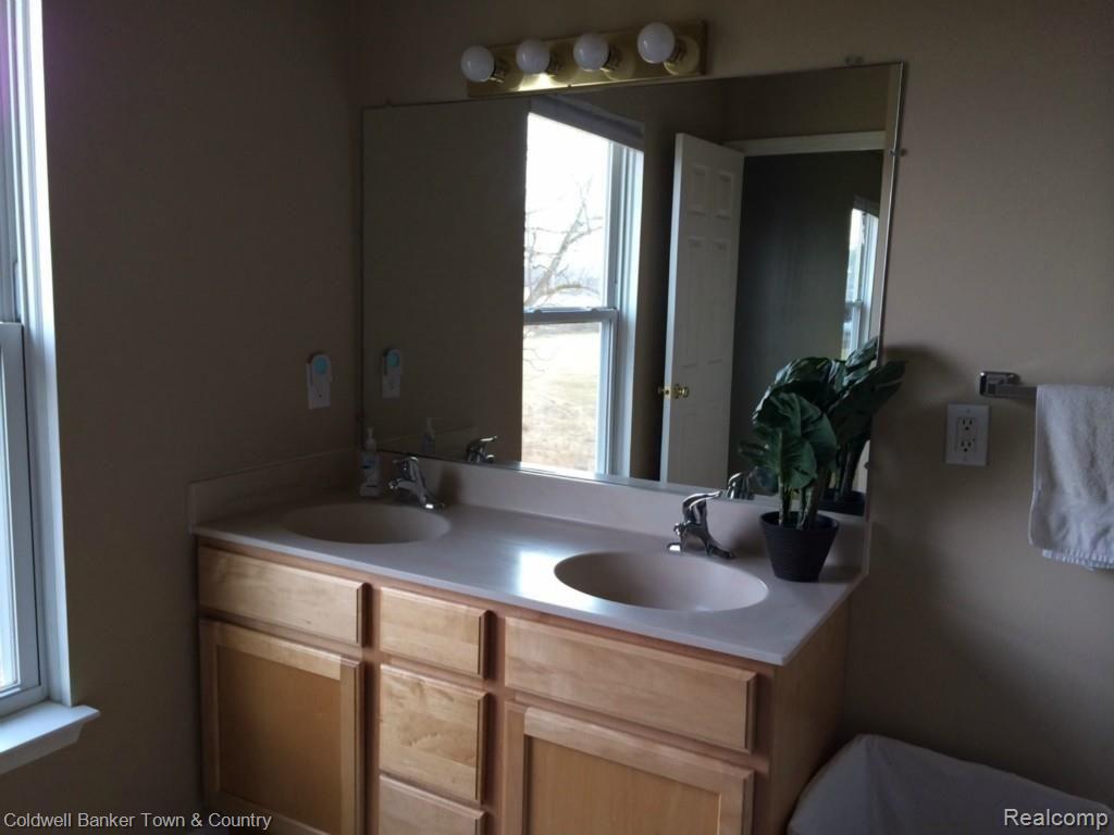 2832 Fisher Road Howell, MI 48855 - Photo 25 of 37 Double Sinks in Bath