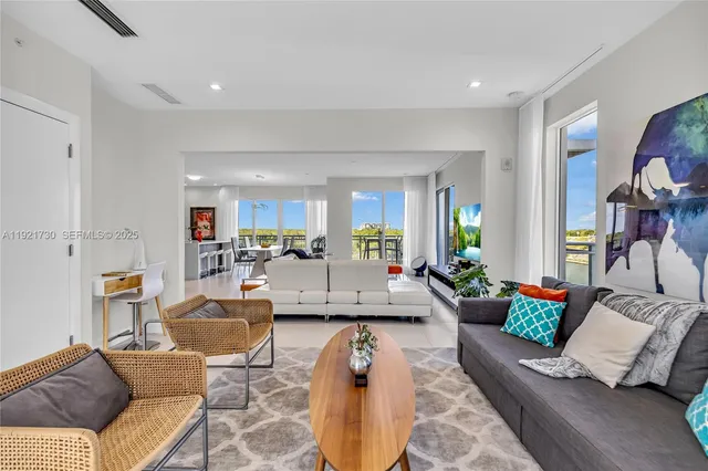 a living room with furniture and a couch