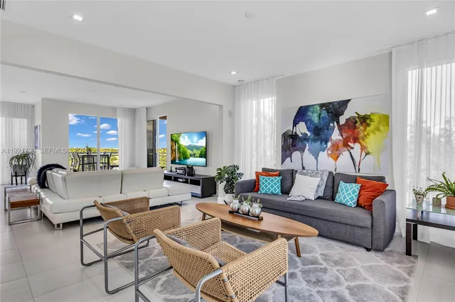 a living room with furniture and a couch