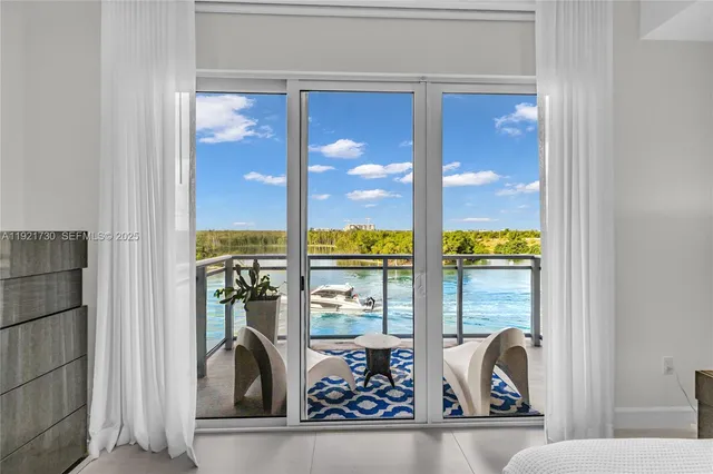 a view of a living room and bathroom