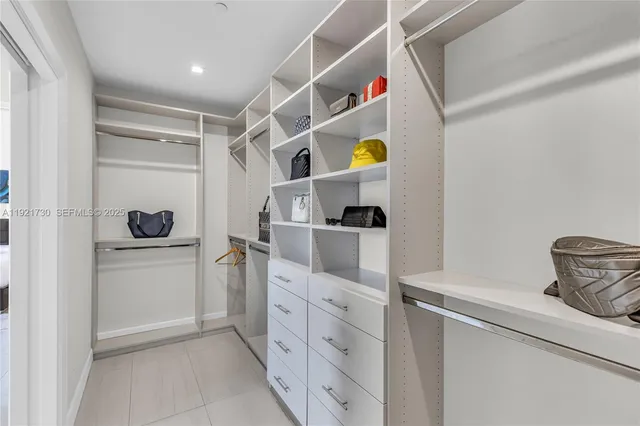 a kitchen with cabinets and appliances