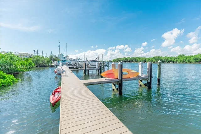 a view of a lake with a big yard