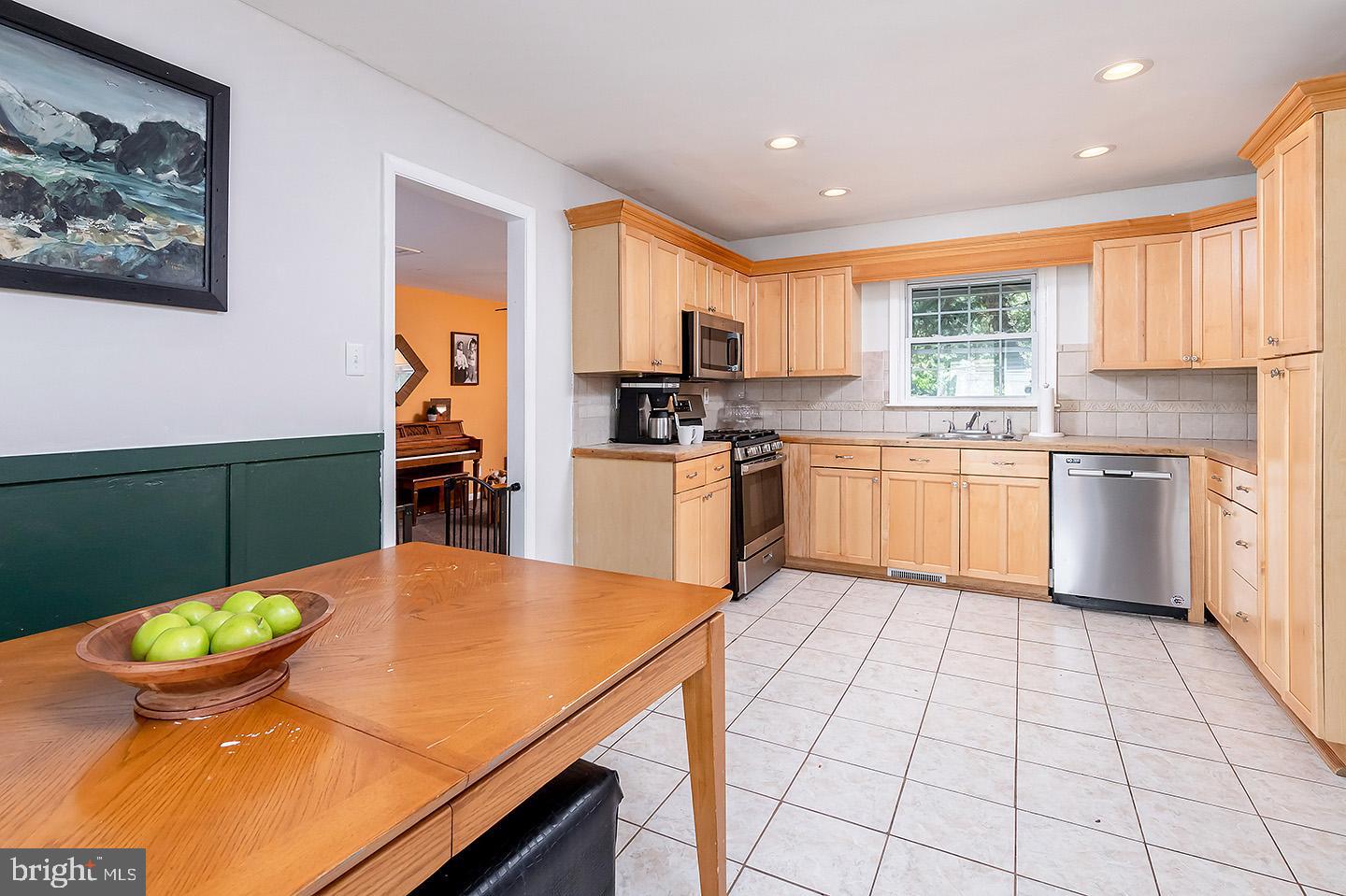 527 Boundary Road Pitman, NJ 08071 - Photo 14 of 21 Eat in Kitchen with tile flooring.
