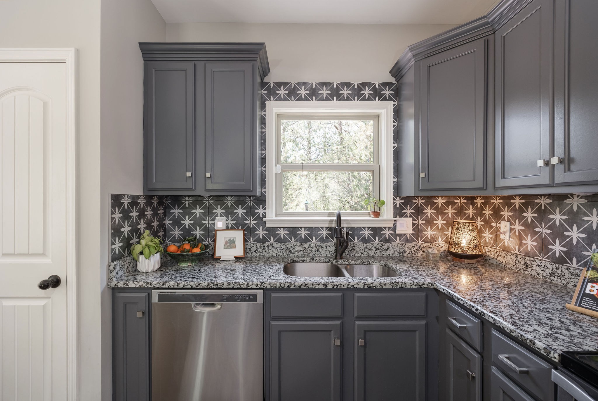 7113 Rusty Drive Fairview, TN 37062 - Photo 19 of 67 a kitchen with stainless steel appliances granite countertop a sink stove and cabinets