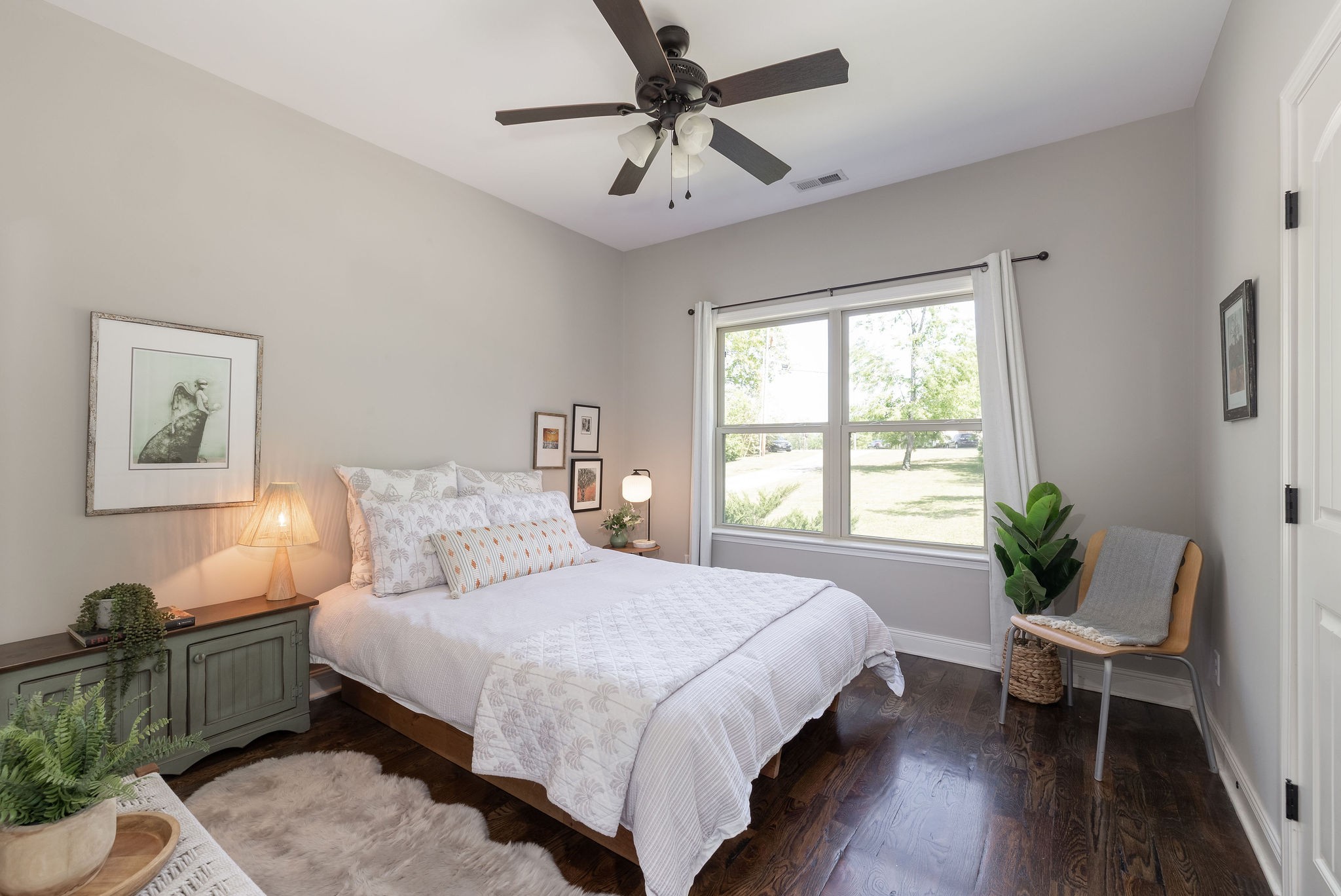 7113 Rusty Drive Fairview, TN 37062 - Photo 34 of 67 a bedroom with a bed and a chandelier