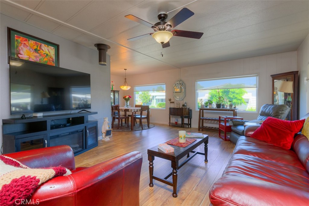 1901 Dayton Road, Unit 133 Chico, CA 95928 - Photo 6 of 36 a living room with furniture and a flat screen tv