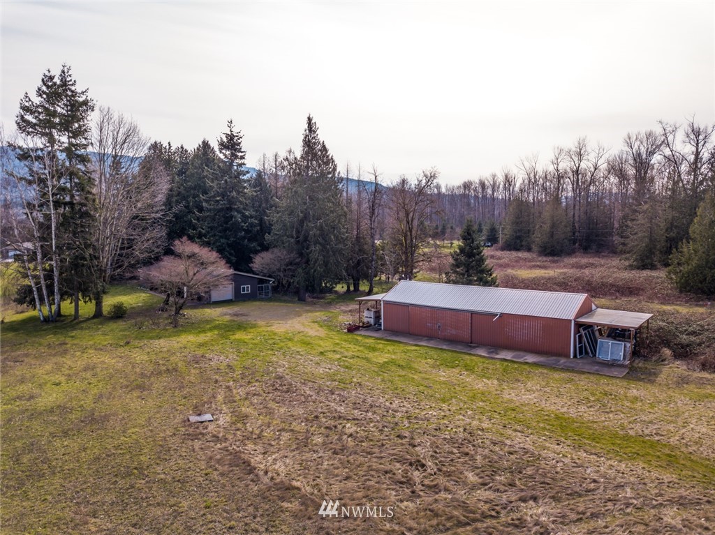3626 Back Acre Road Everson, WA 98247 - Photo 2 of 6 a view of a house with a yard and sitting area