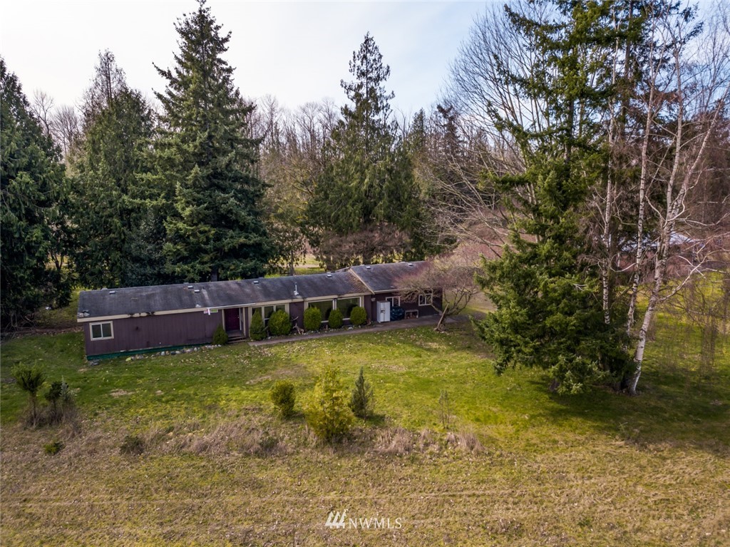 3626 Back Acre Road Everson, WA 98247 - Photo 3 of 6 a swimming pool with some trees in the background
