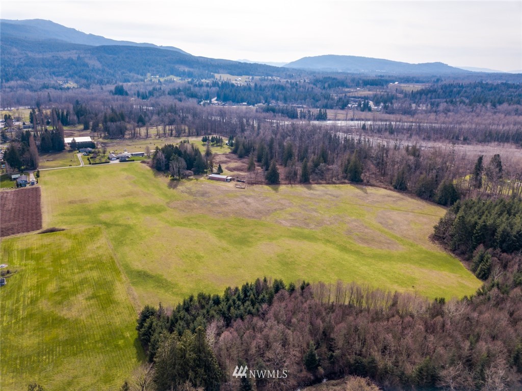 3626 Back Acre Road Everson, WA 98247 - Photo 5 of 6 a view of a lake with mountains in the background