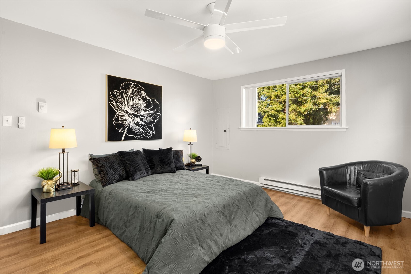 4515 Northeast 17th Place Renton, WA 98059 - Photo 18 of 36 a bedroom with a bed and a couch