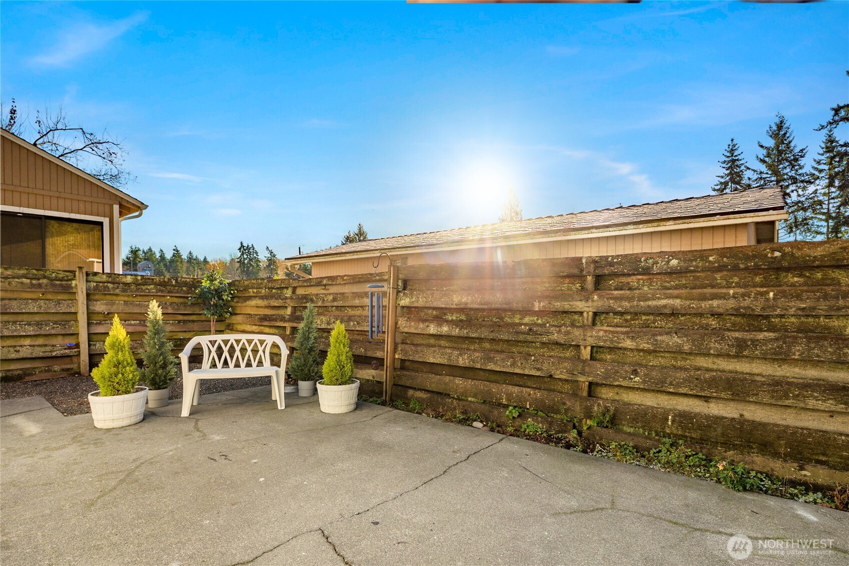 4515 Northeast 17th Place Renton, WA 98059 - Photo 25 of 36 a view of a terrace with chair and a fire pit