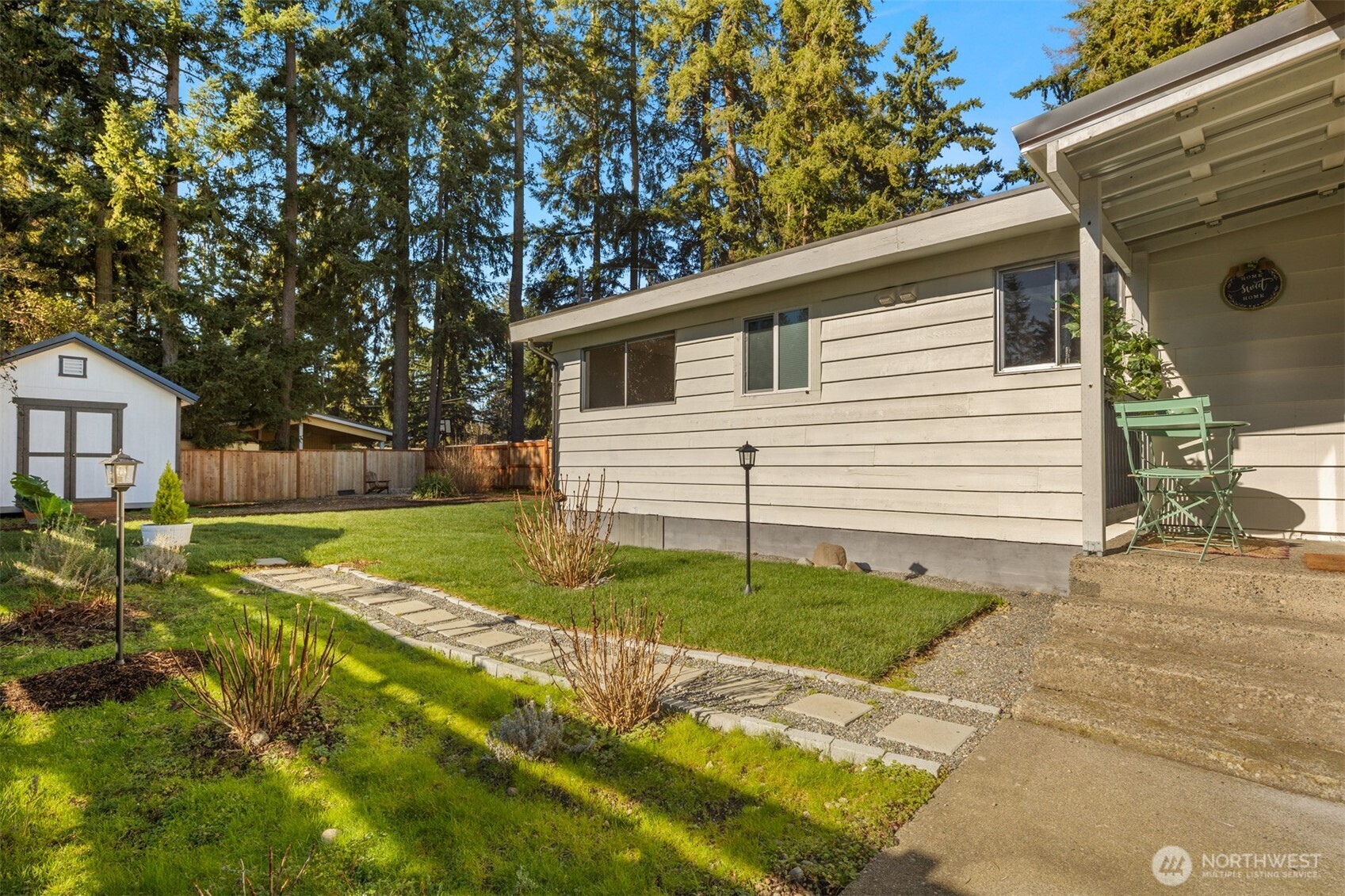 4515 Northeast 17th Place Renton, WA 98059 - Photo 27 of 36 a front view of a house with a yard