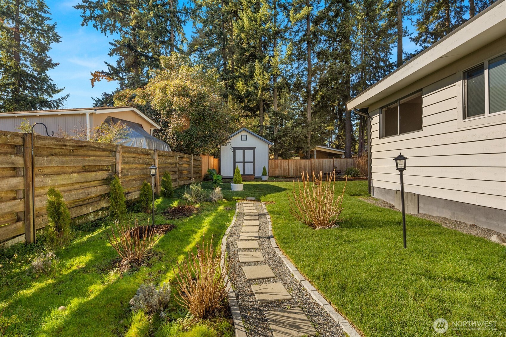4515 Northeast 17th Place Renton, WA 98059 - Photo 28 of 36 a front view of a house with garden