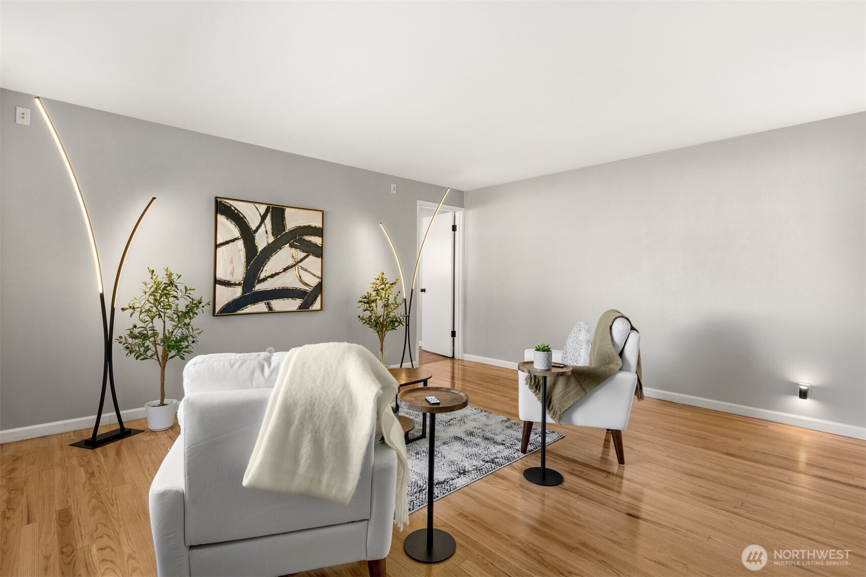 4515 Northeast 17th Place Renton, WA 98059 - Photo 3 of 36 a living room with furniture and wooden floor