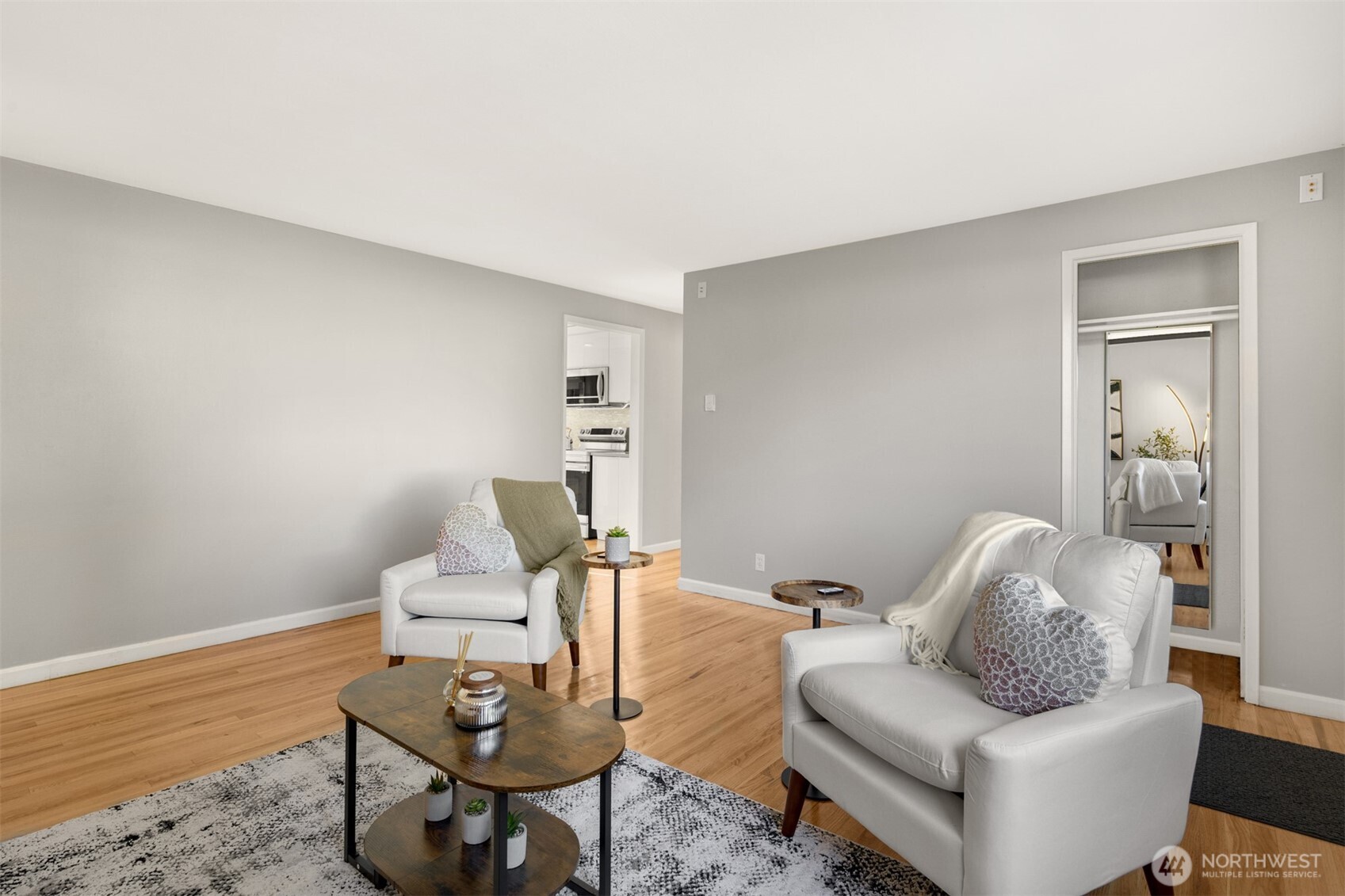 4515 Northeast 17th Place Renton, WA 98059 - Photo 5 of 36 a living room with furniture and a wooden floor