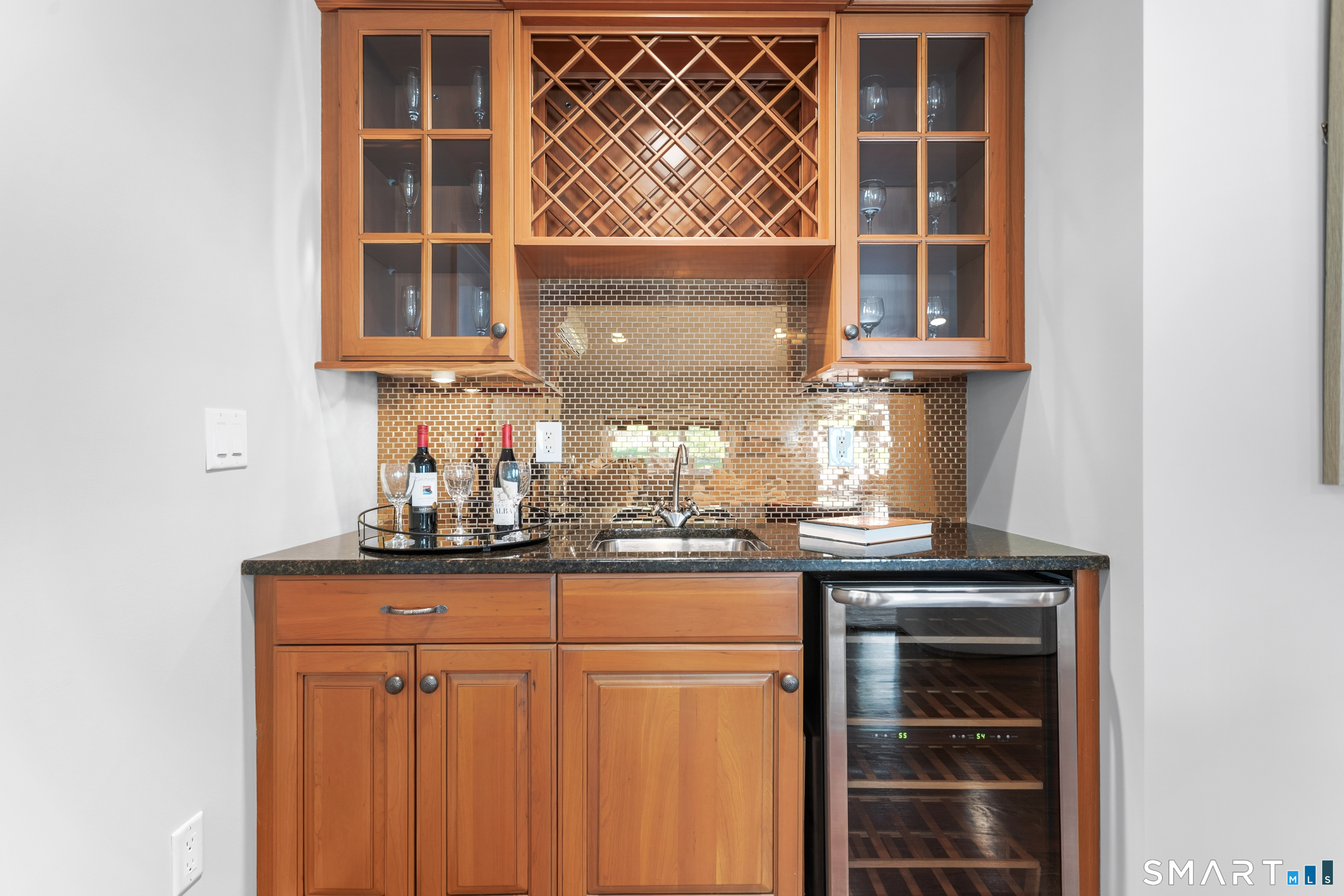24 Burr School Road Westport, CT 06880 - Photo 15 of 40 Inviting built-in wet-bar with beverage cooler